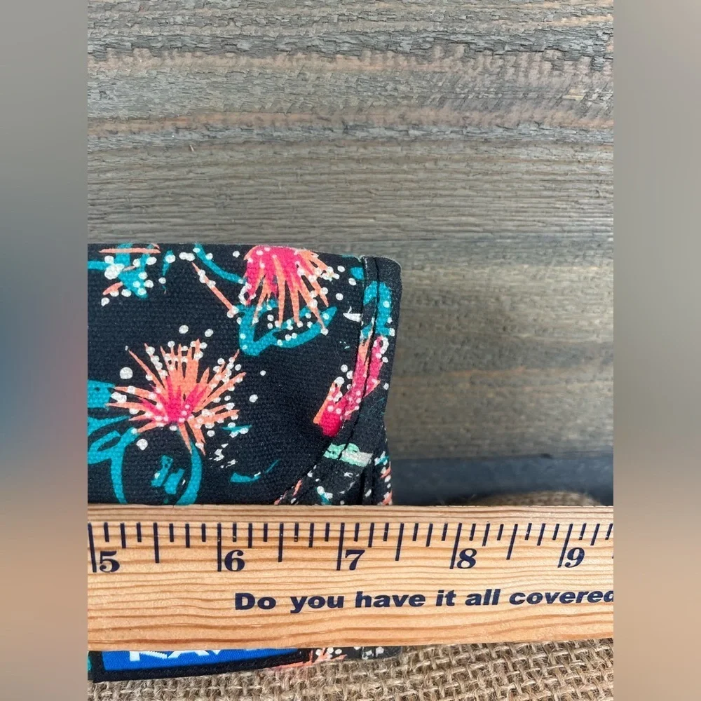 KAVU Big Spender tri-fold wallet in a black‎ canvas with a Floral Print
